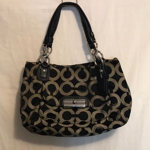 Black and beige Coach bag